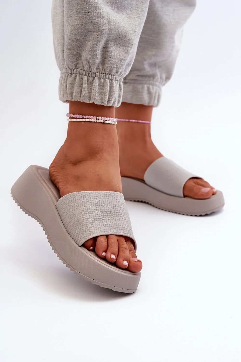 TEEK - Textured Skin Platform Slides